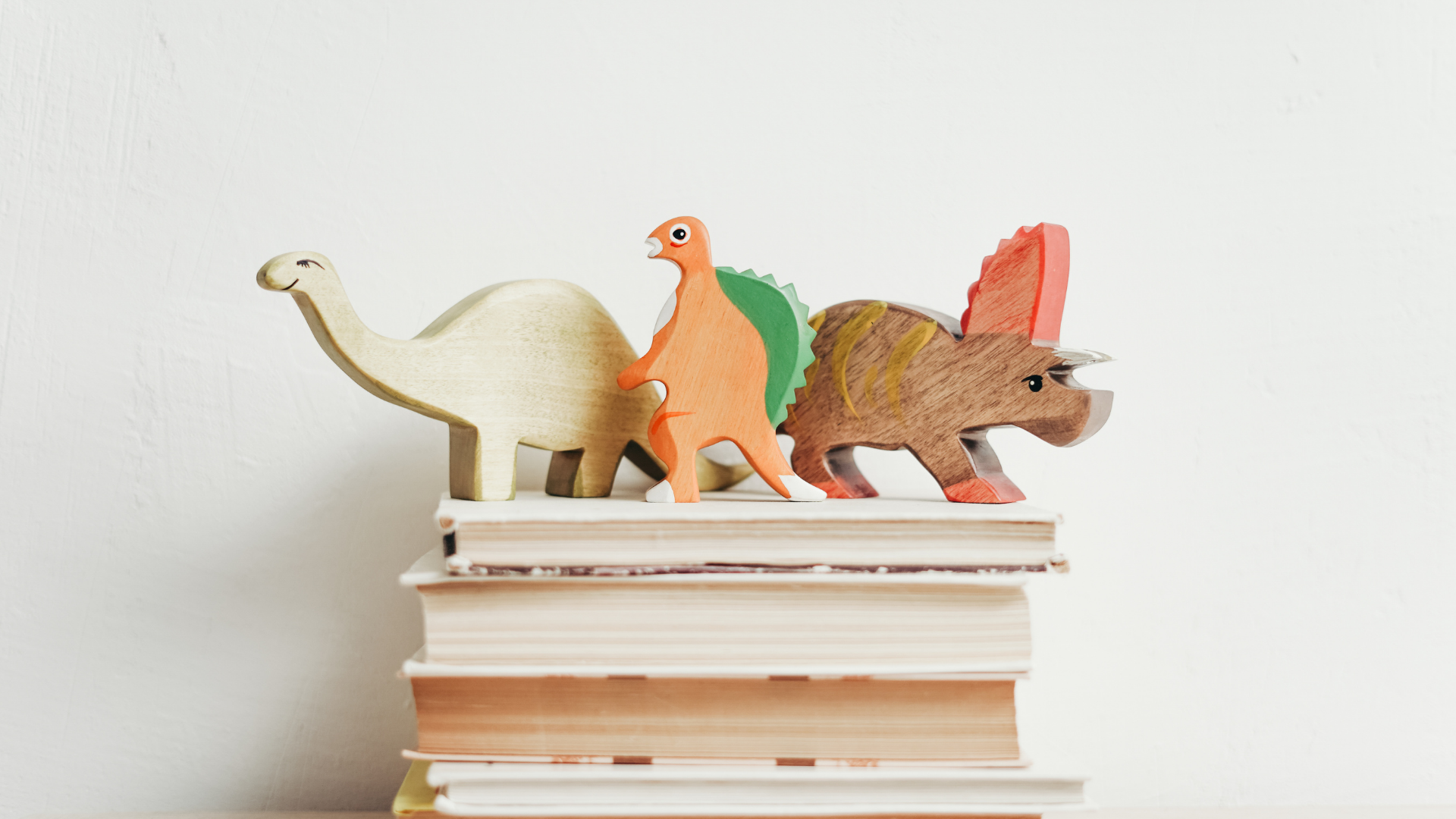 three-wooden-dinosaur